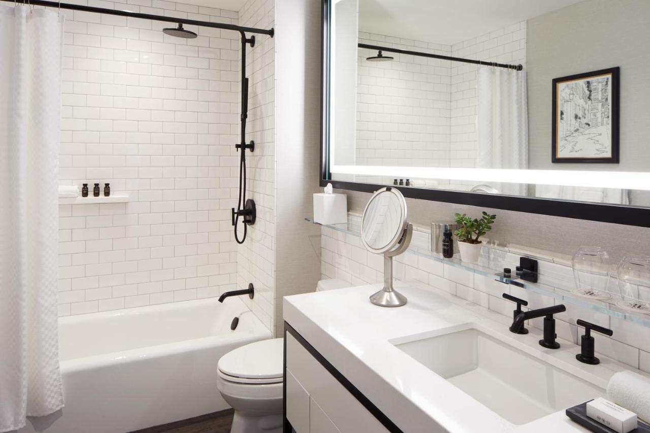 The Whitney Hotel Boston Exterior photo A bathroom with a shower curtain